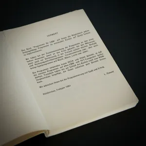 Open book showing German foreword page titled 'VORWORT' with text about CBM programming, dated Holzkirchen, Frühjahr 1981