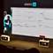 ElasticON conference presentation showing security analytics dashboard on large screen with Elastic branded boxes on stage in San Francisco