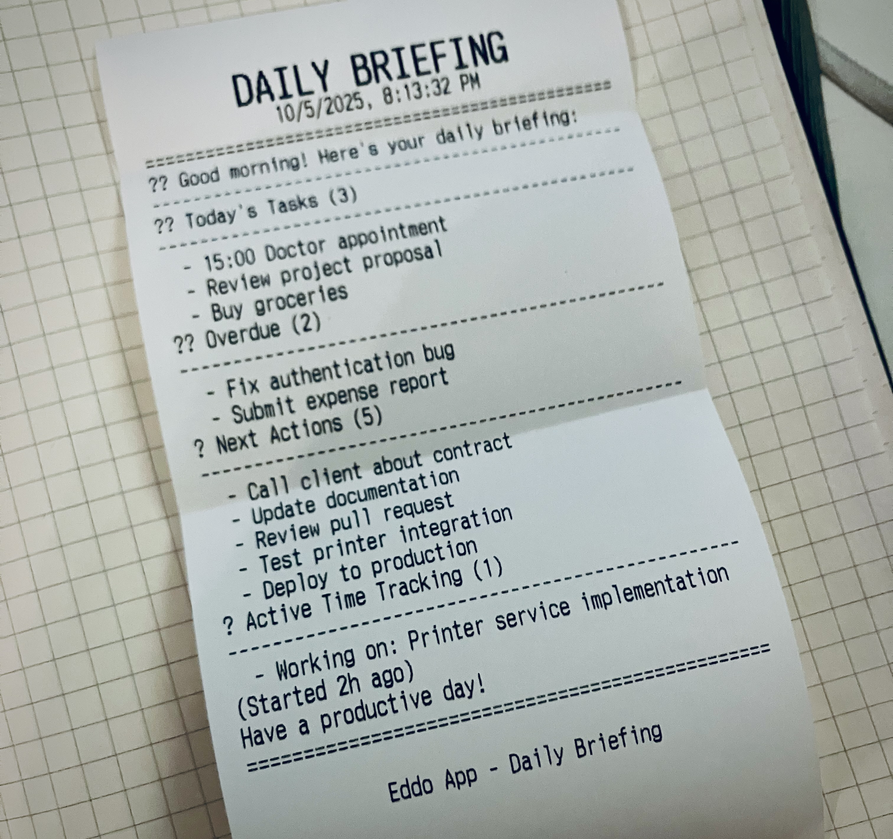 Thermal receipt printout showing a daily briefing from Eddo GTD app dated 10/5/2025, displaying today's tasks (doctor appointment, project review, groceries), overdue items (authentication bug fix, expense report), next actions (client calls, documentation updates), and active time tracking for printer service implementation
